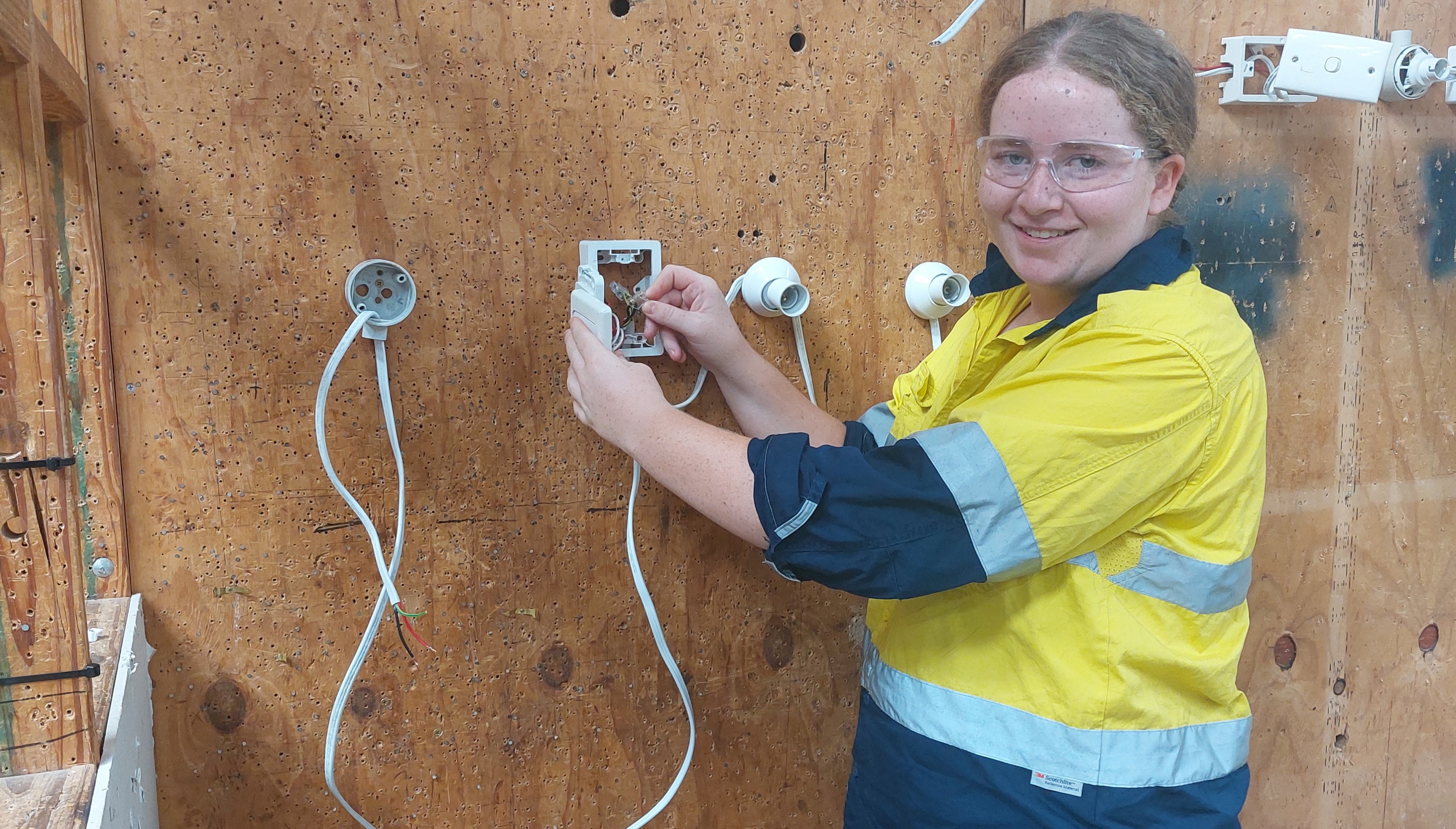 student developing practical trade skills through electrical work training, reflecting vocational pathways and hands-on learning